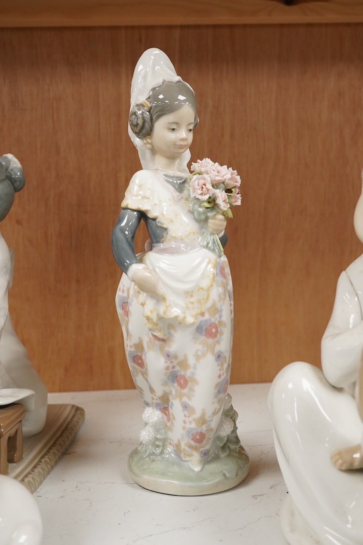 A collection of five Lladro figures, largest 24cm high